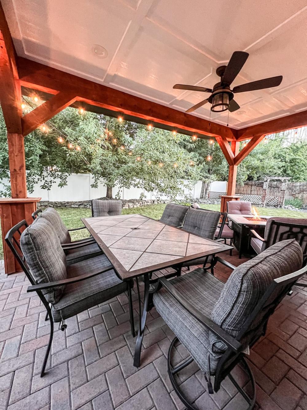 Covered patio with string lights at The Hayden Hideaway