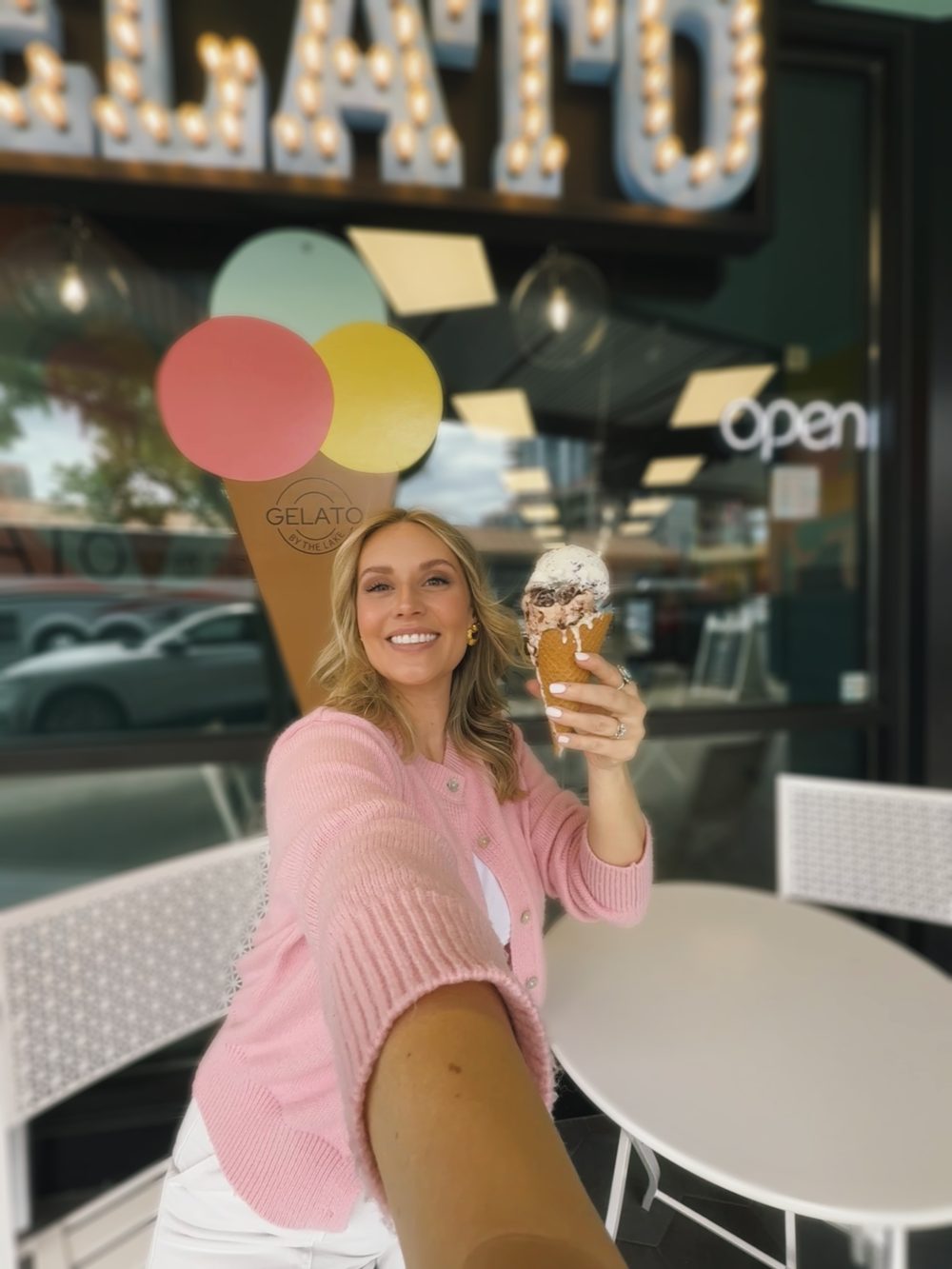 Kiana holding a gelato cone outside a downtown gelato shop